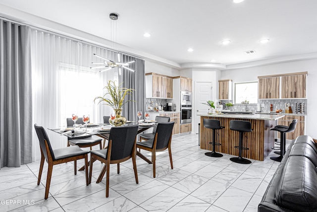 341 Sleepy Run St, El Paso, TX 79928 - dining space with light marble finish floors and recessed lighting