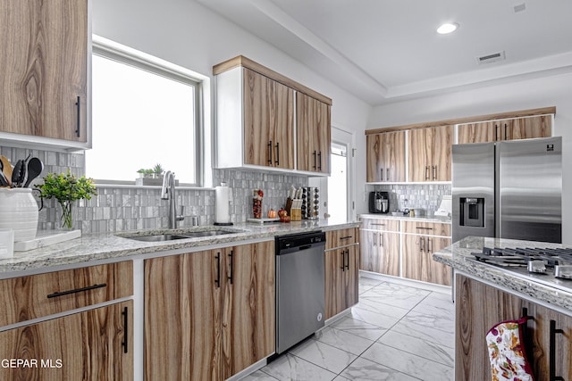 341 Sleepy Run St, El Paso, TX 79928 - kitchen featuring stainless steel appliances, a sink, plenty of natural light, light marble finish flooring, and recessed lighting