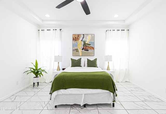 341 Sleepy Run St, El Paso, TX 79928 - bedroom with light marble finish flooring, a raised ceiling, recessed lighting, and baseboards