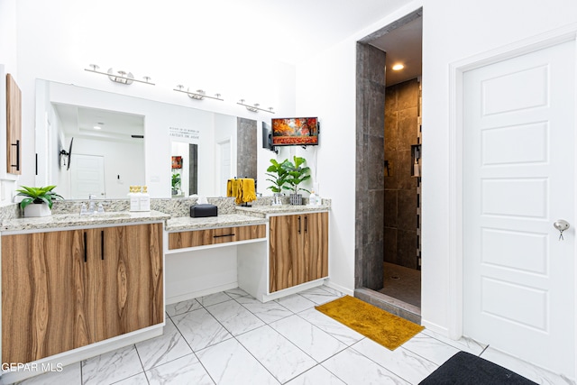 341 Sleepy Run St, El Paso, TX 79928 - bathroom with marble look tile flooring, a walk in shower, and vanity