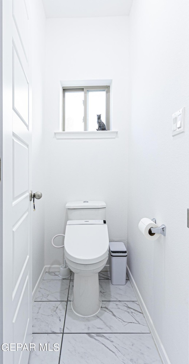 341 Sleepy Run St, El Paso, TX 79928 - bathroom featuring marble finish flooring, baseboards, and toilet