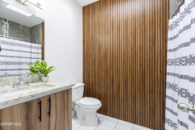 341 Sleepy Run St, El Paso, TX 79928 - bathroom with toilet, vanity, a shower with curtain, and marble finish flooring