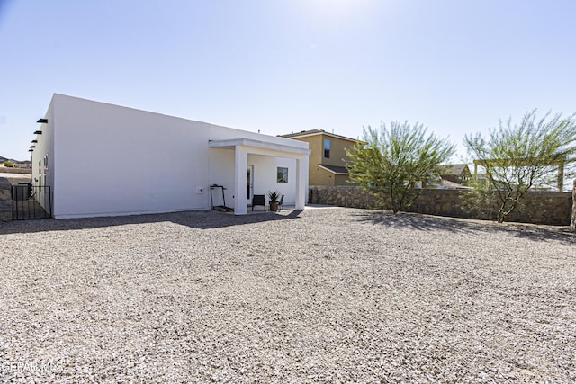 341 Sleepy Run St, El Paso, TX 79928 - rear view of house featuring stucco siding, a fenced backyard, and central AC unit