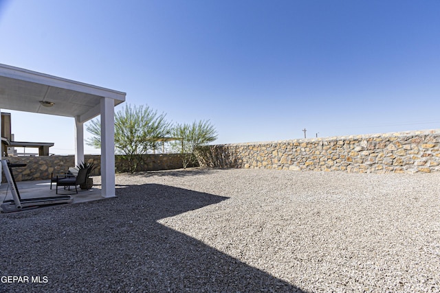 341 Sleepy Run St, El Paso, TX 79928 - fenced backyard featuring a patio