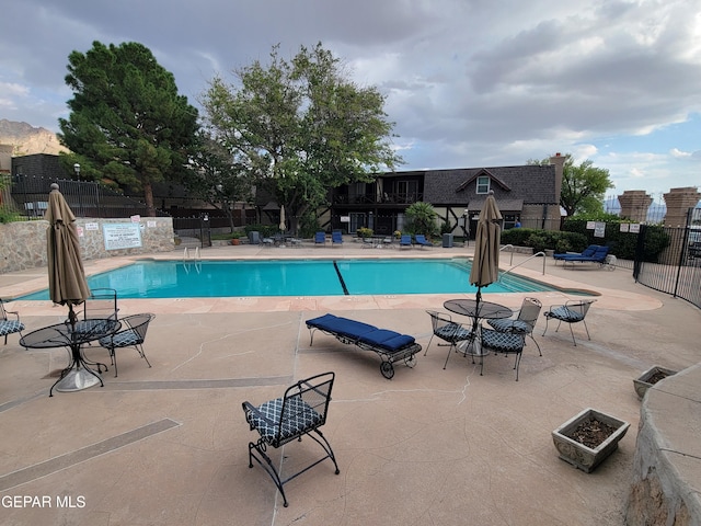 view of swimming pool featuring a patio