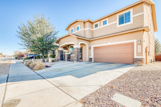 view of front of home with a garage