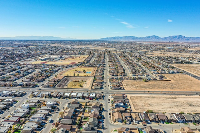 drone / aerial view featuring a mountain view