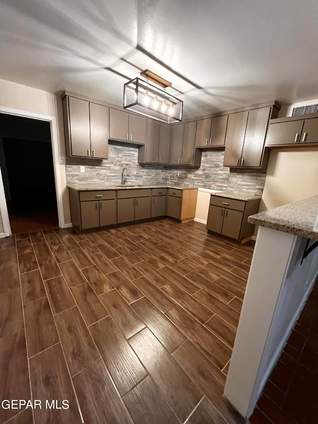 kitchen with sink and backsplash