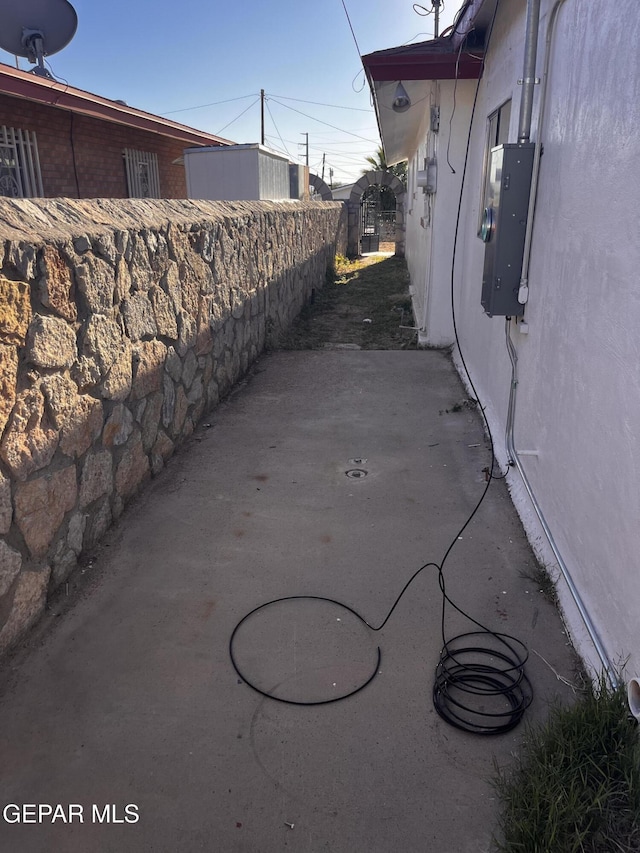 view of patio featuring electric panel