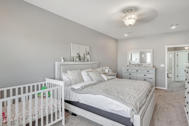 14805 Sam Garcia Ave, El Paso, TX 79938 - bedroom featuring light carpet, baseboards, and a ceiling fan