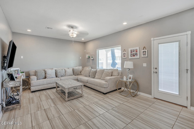 living room with ceiling fan