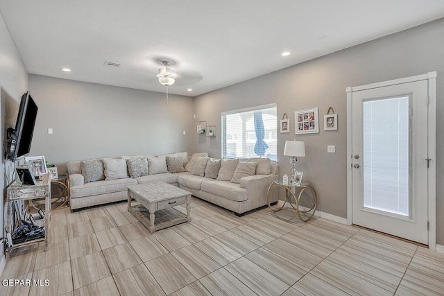 14805 Sam Garcia Ave, El Paso, TX 79938 - living area with a ceiling fan, recessed lighting, and light tile patterned flooring
