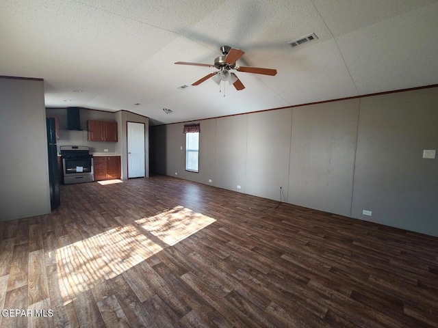 unfurnished living room with a ceiling fan, a textured ceiling, visible vents, vaulted ceiling, and dark wood-style floors