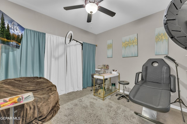 interior space featuring carpet floors and ceiling fan