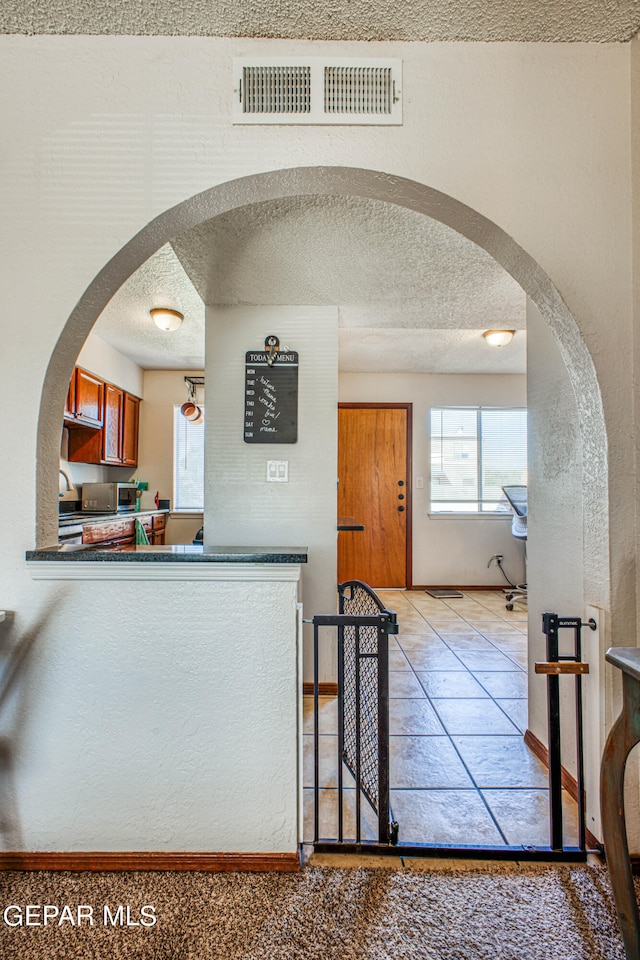 kitchen with a textured ceiling