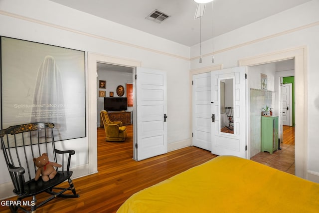 bedroom featuring wood-type flooring