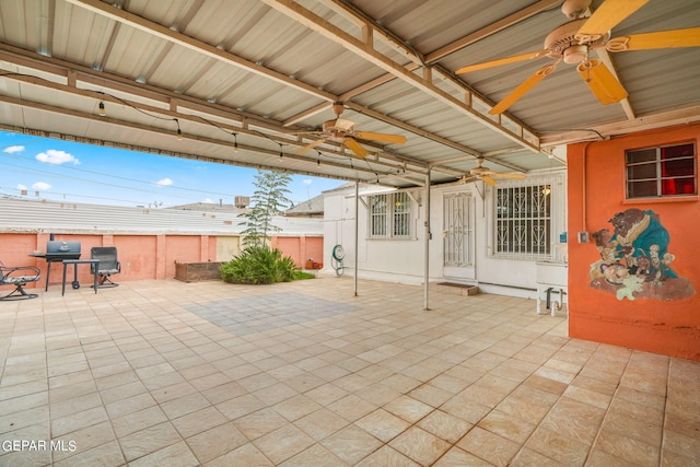 view of patio / terrace featuring ceiling fan