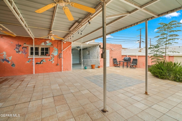 view of patio / terrace featuring ceiling fan