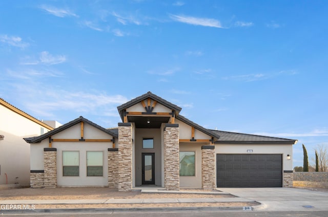 view of front of home with a garage