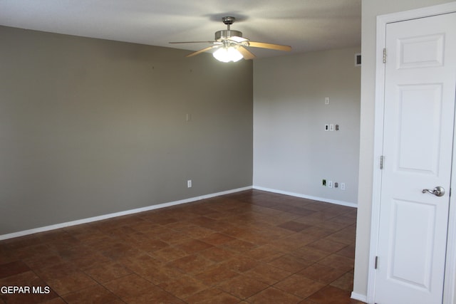 spare room featuring ceiling fan