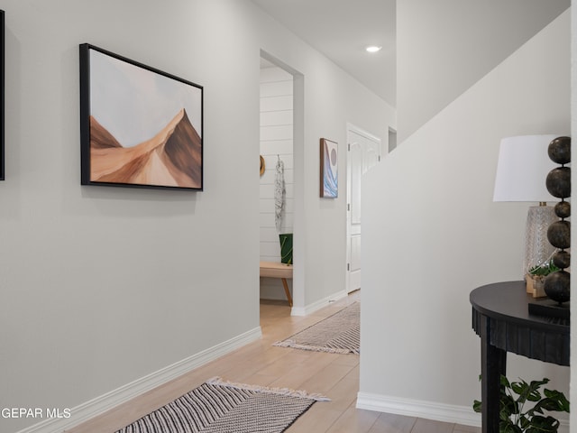 hall with light wood-type flooring