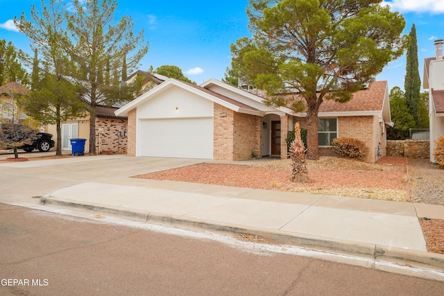 ranch-style house featuring a garage