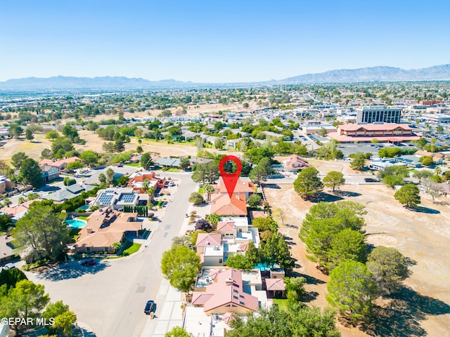 drone / aerial view featuring a mountain view