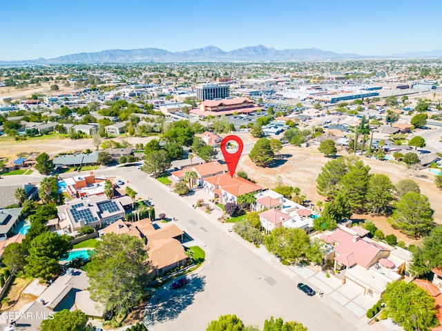 drone / aerial view featuring a mountain view