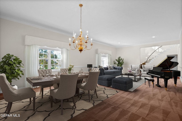 dining space with carpet flooring, a notable chandelier, and crown molding