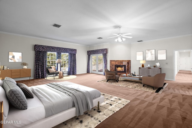 carpeted bedroom featuring a fireplace, ceiling fan, and crown molding