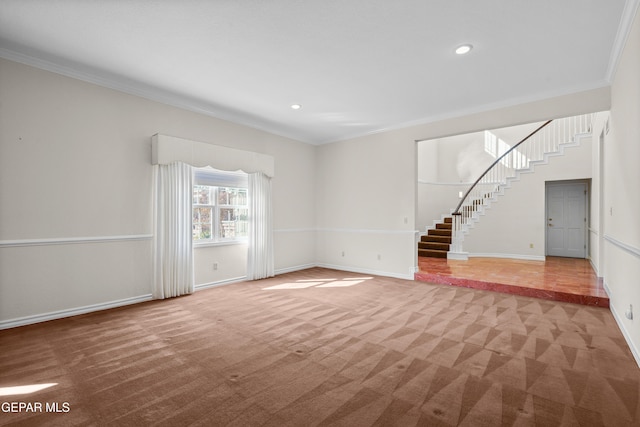 unfurnished living room with carpet flooring and crown molding