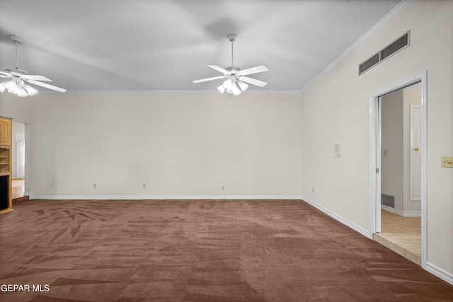 spare room with ceiling fan, carpet flooring, and ornamental molding