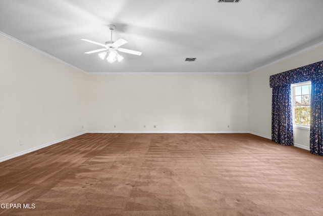 empty room with light colored carpet, ceiling fan, and crown molding