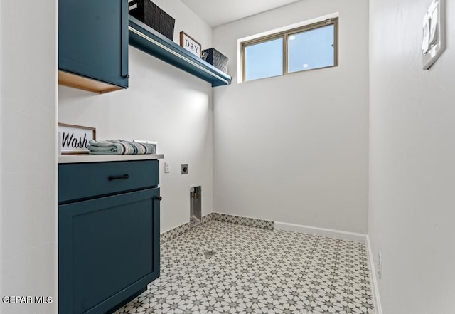 laundry area featuring cabinets and electric dryer hookup