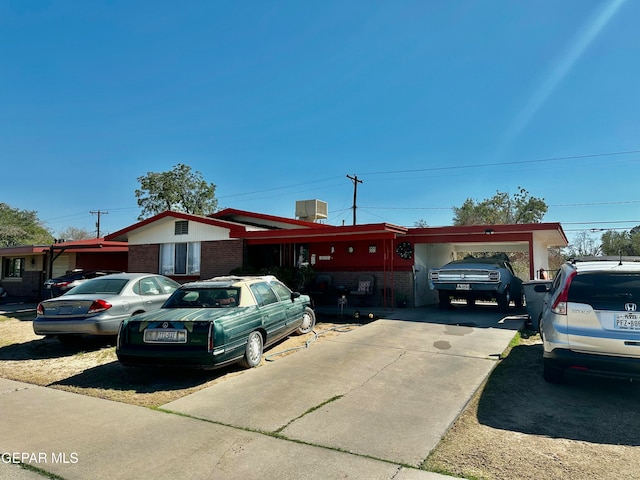 ranch-style home with a garage