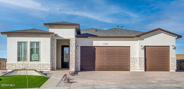 view of front of property featuring a garage