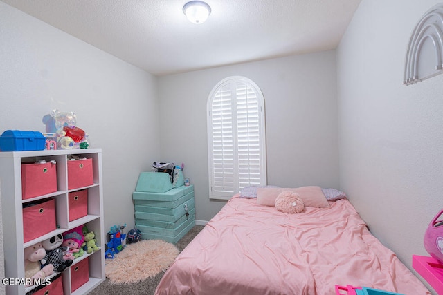 bedroom featuring carpet