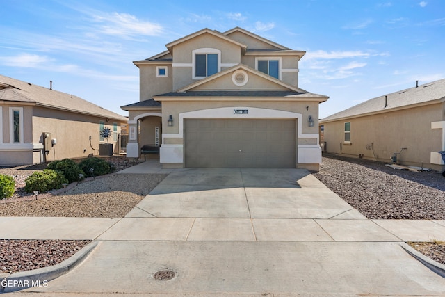 front of property with a garage