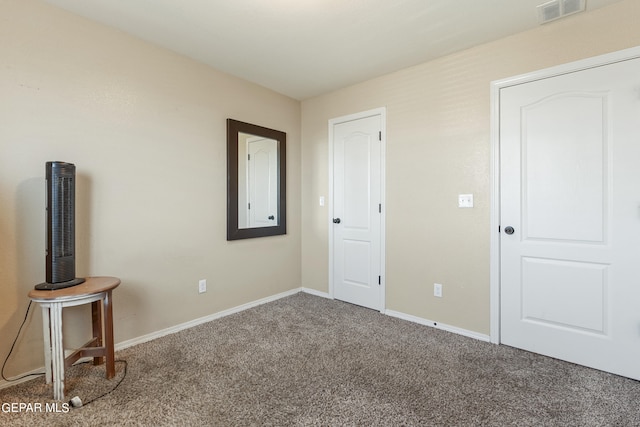 unfurnished bedroom with carpet