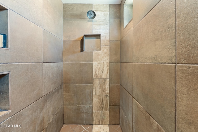 room details with a tile shower