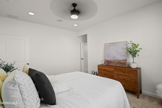 carpeted bedroom featuring recessed lighting, visible vents, a ceiling fan, and baseboards