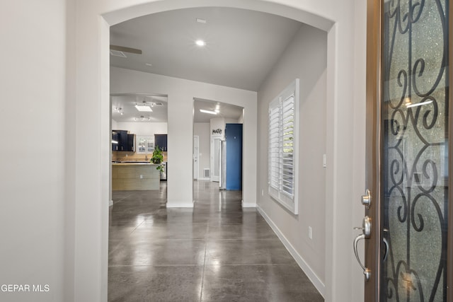 entryway with vaulted ceiling