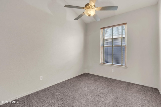 unfurnished room with carpet flooring and ceiling fan