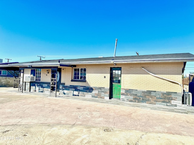 view of front facade with a patio area