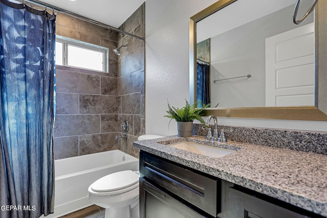 full bathroom featuring vanity, toilet, and shower / bath combo with shower curtain