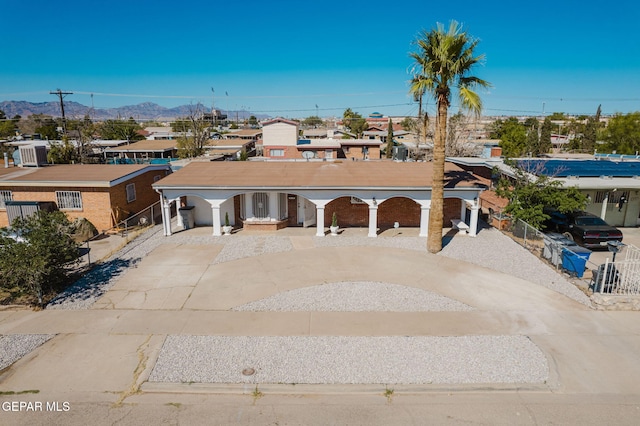 view of front of property featuring a mountain view