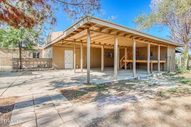 rear view of house with a patio area