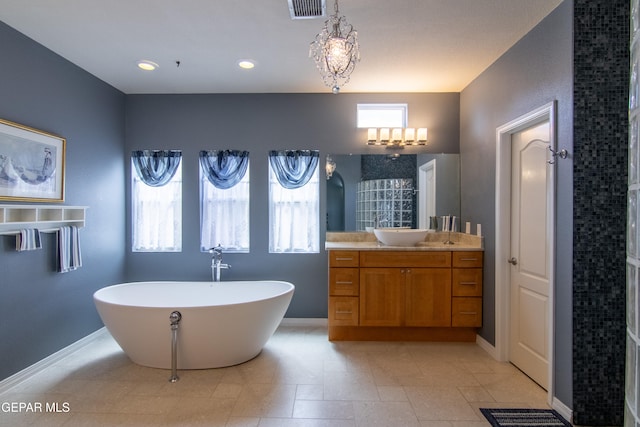 bathroom featuring vanity and a bathing tub