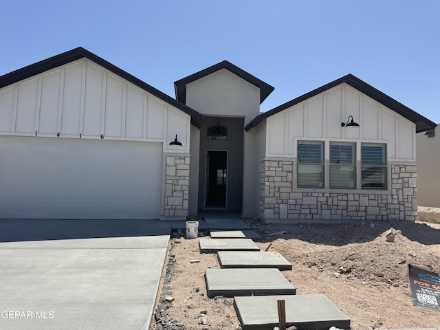 1416 Dylan Pl, El Paso, TX 79928 - ranch-style house featuring board and batten siding, stone siding, and an attached garage