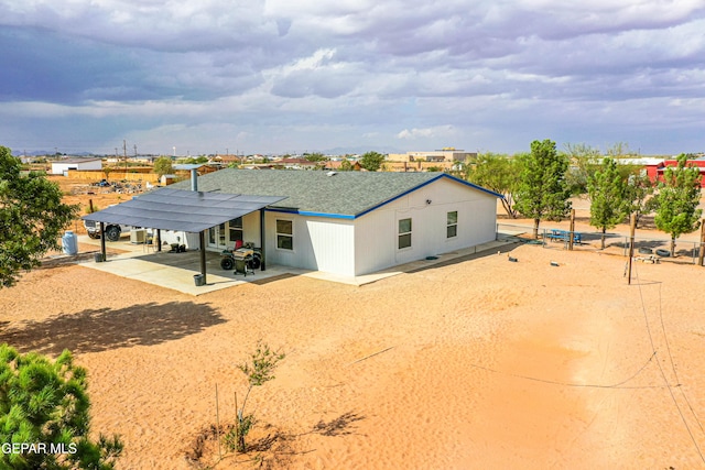 rear view of property with a patio